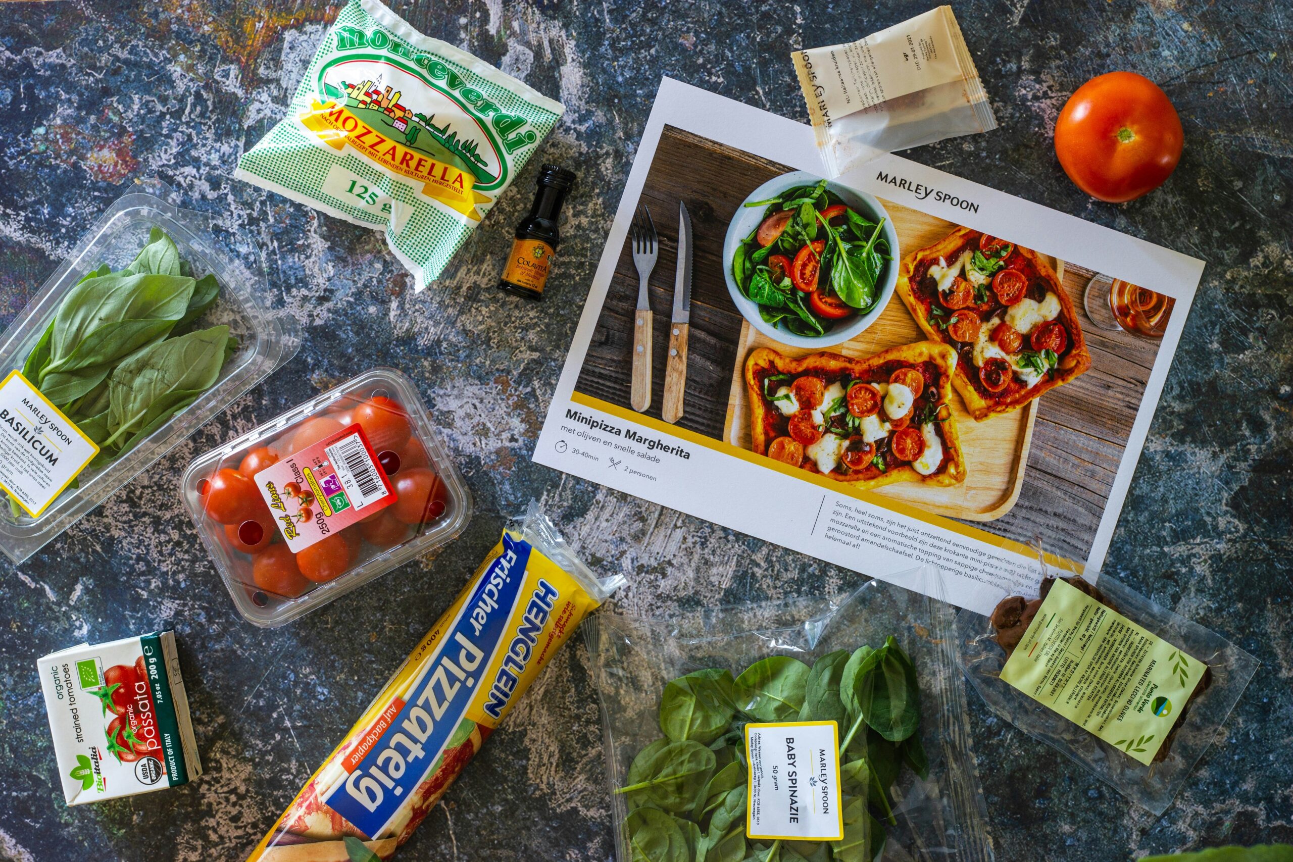 Close-up of various dog food packaging showing nutritional information