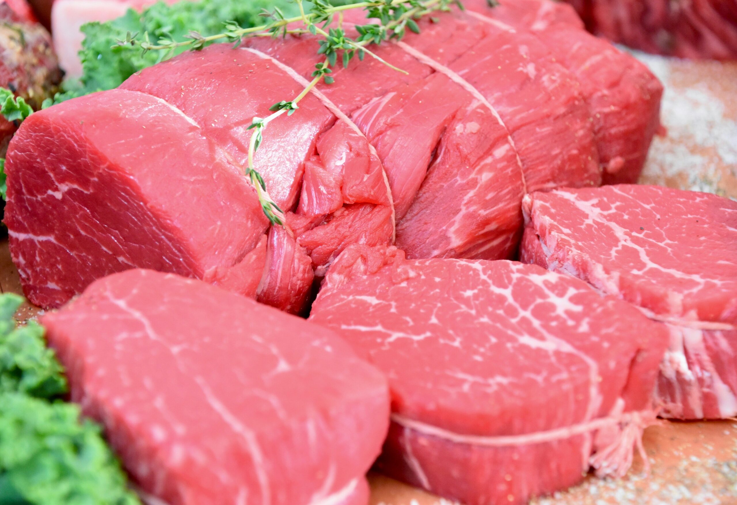 Infographic showing the nutrient breakdown of venison compared to beef and chicken.